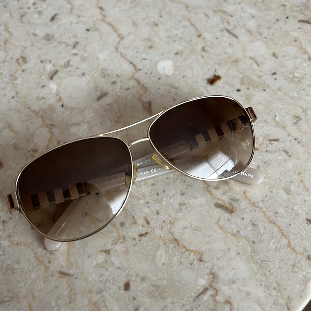 Kate Spade sunglasses. Like new. No scratches or major signs of wear. In case.